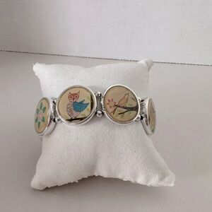 Super cute spring owl and bird and flower stretchy bracelet.